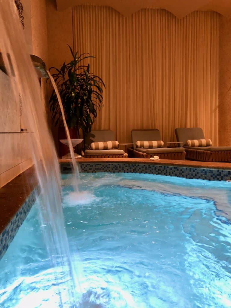 Spring Break St. Pete Hotel. Inside the Sand Pearl Resort Spa has beautiful waterfalls and Jacuzzi hot tub, lounge chairs, and they serve the most refreshing fruit flavored water.