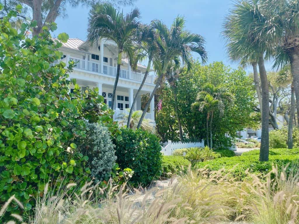 photo of a beautiful white beach home overlooking the sea in pass-a-grille beach