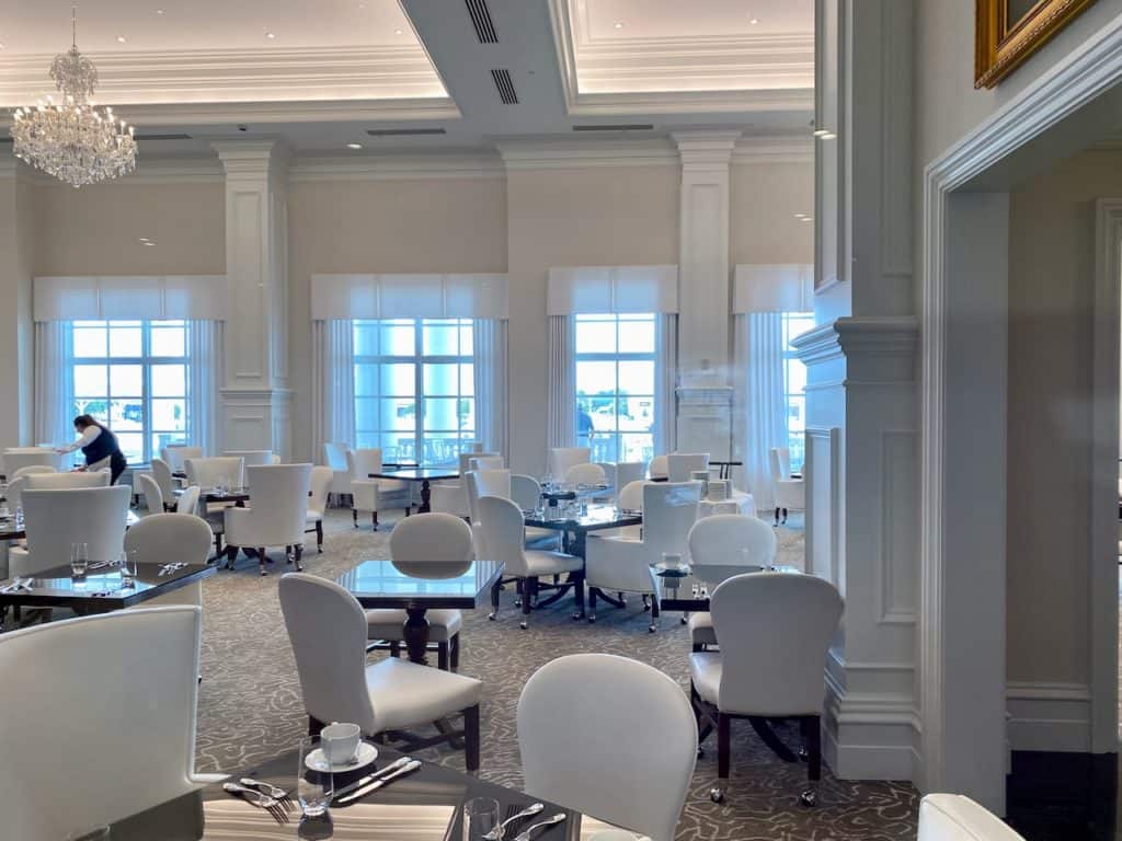 World Equestrian Center Ocala - Stirrups Restaurant - showing seating with their expansive restaurant, tall ceilings, and crystal chandeliers