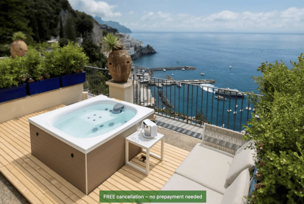 Boutique Hotels Amalfi Coast, NH Collection Grand Hotel outdoor hot tub on the deck overlooking the sea. Amazing views of the blue water.