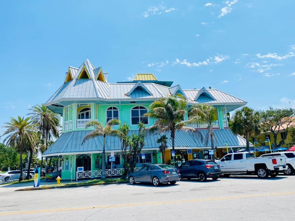 Photo of The Hurricane Restaurant in Pass-a-Grille - green exterior that faces the gulf.