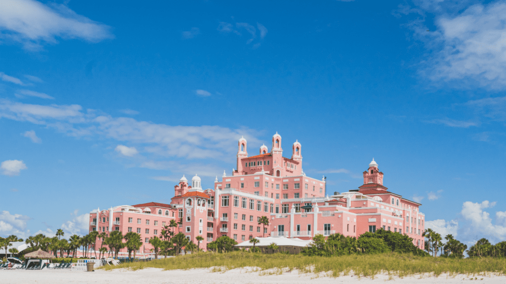 Bright colorful, pink hotel on the beach with gorgeous gulf views and white sandy beaches. Don CeSar Hotel in the ideal 5-star beach resort in St Pete Beach.