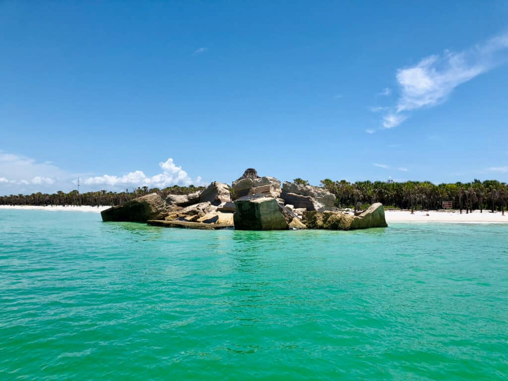 Photos of the rocks at Egmont Key State Park and gorgeous blue water for snorkeling.