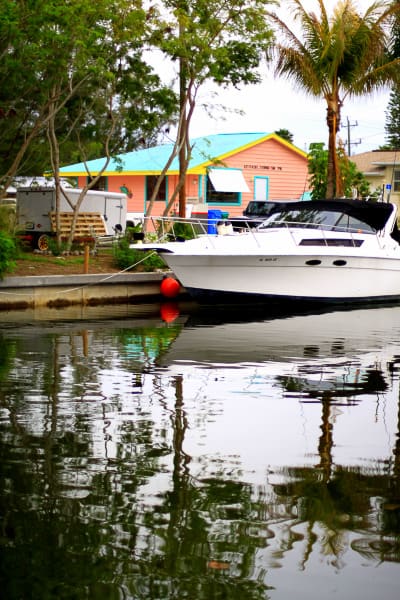 View of water and boat near one of the best pine island restaurants - low key tiki.