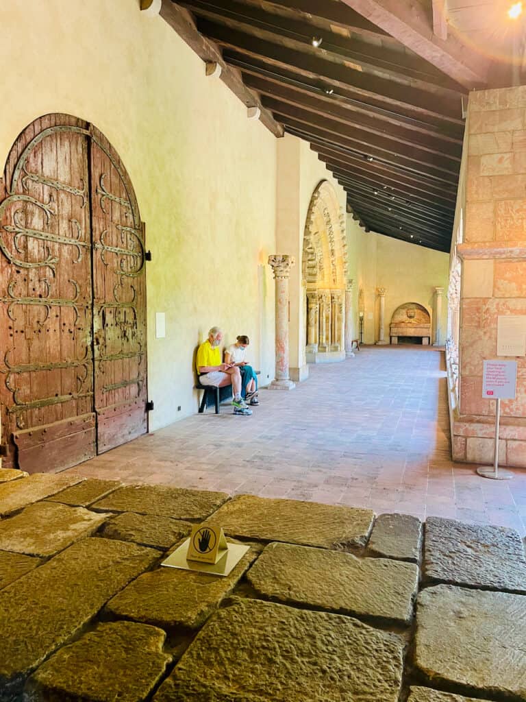The Met Cloisters Museum has a grand exterior with stone walkways.