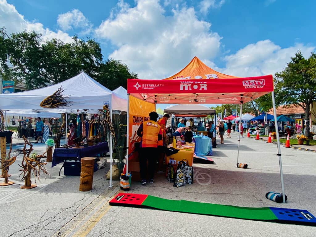 Go to a Festival is one of the top things to do in Gulfport FL. Geckofest booths.