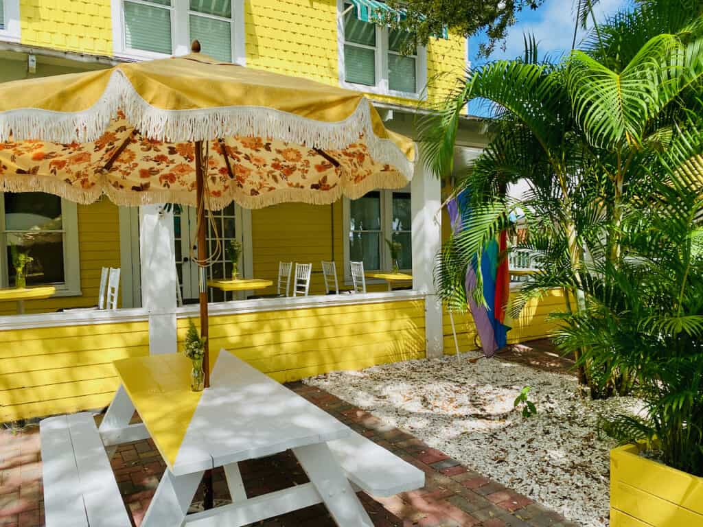 Isabelle's at the Historic Peninsula Inn in Gulfport, FL. It is a charming bright yellow historic hotel in the middle of the town.  