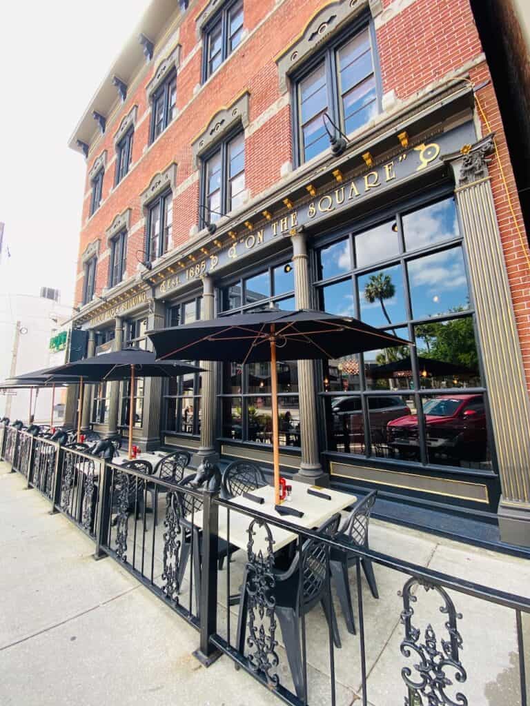 Harry's Seafood Bar & Grille in the Ocala Town Square downtown Ocala. Photo shows exterior view with outdoor seating.