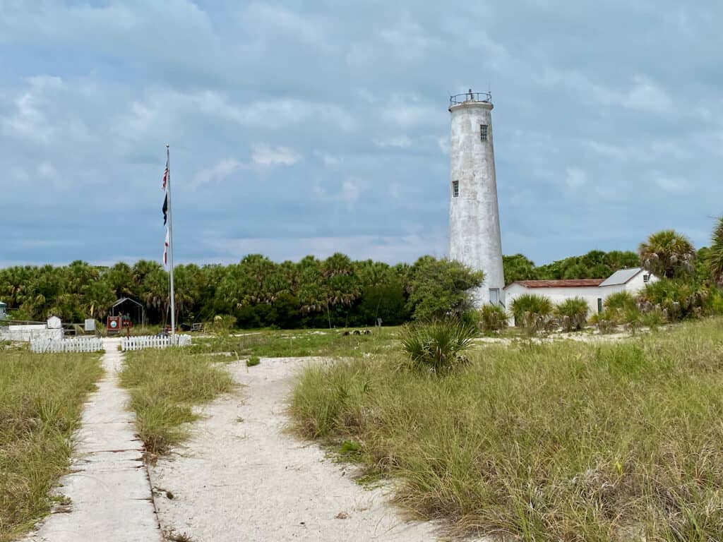 Egmont Key Lighthouse has long grass and turtles nestling in them nearby. Fort DeSoto.