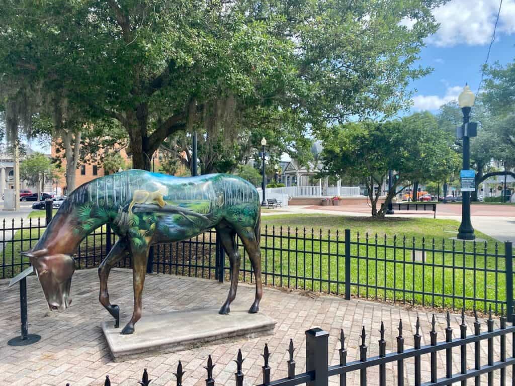 Downtown Ocala photo of the bronze statue painted horse in the square.