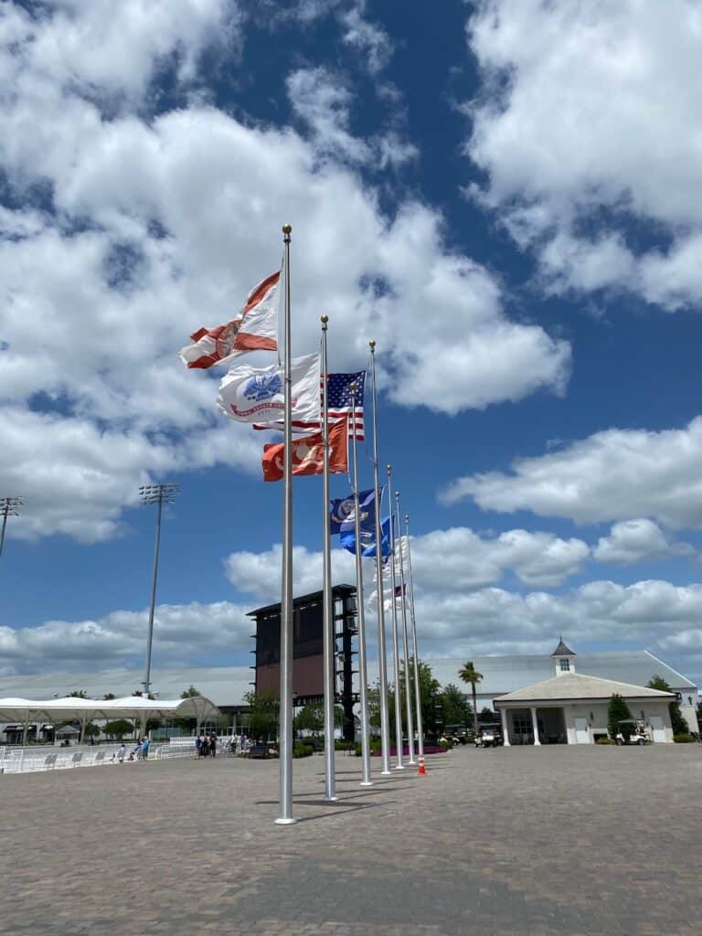 The Equestrian is on property at the world equestrian center. Flags and grand entrance shown.