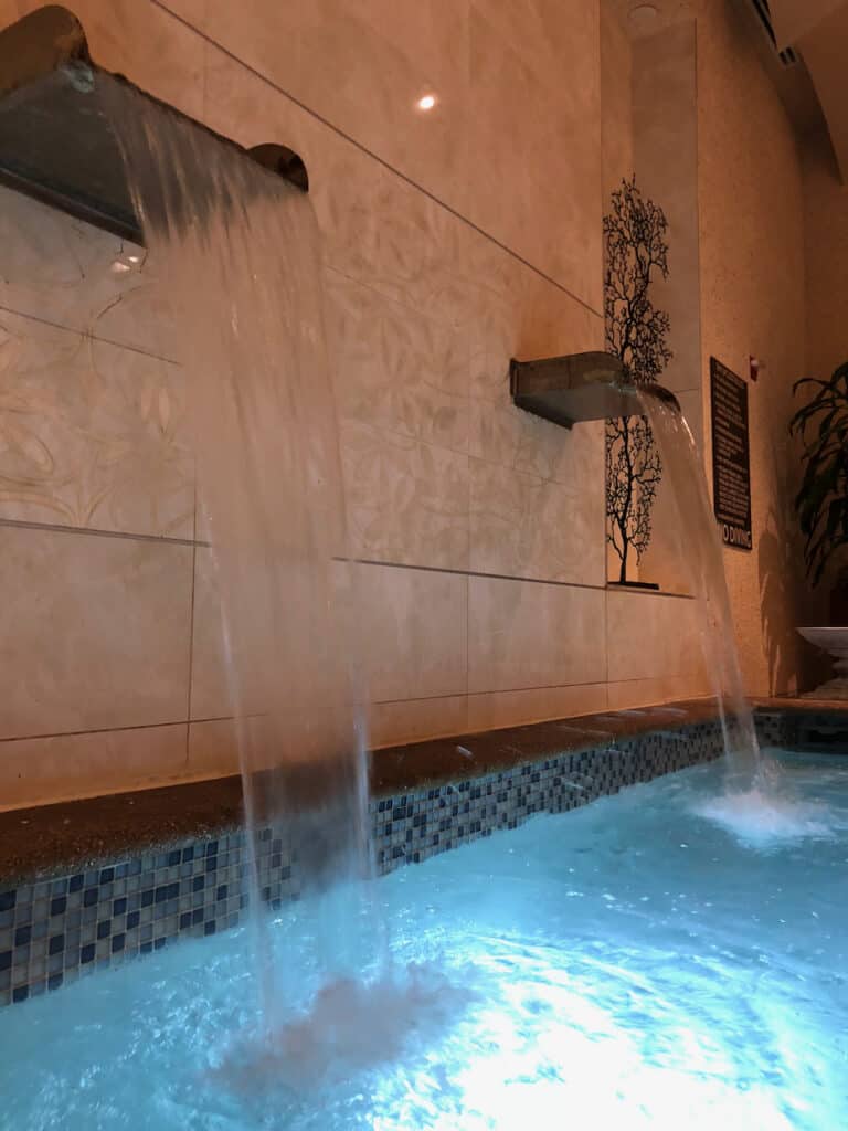 Sandpearl Resort Spa with hot tub shown