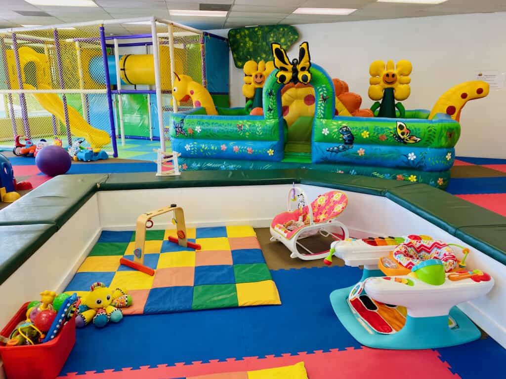 Toddler classes clearwater occur in this large room with lots of musical instruments and toys to engage with at munchkin town