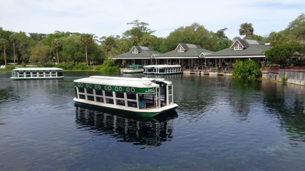 Silver Springs State Park in Ocala Florida. Photo of the glass bottom boats in and water views of the historical structures in the distance.