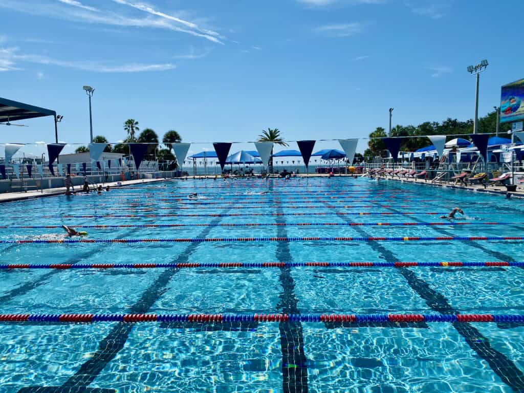 North Shore Aquatic Complex with lots of swimmers in the pool.