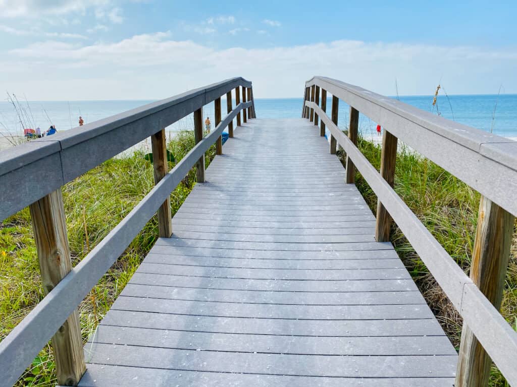 Treasure Island Boardwalk view of beautiful white sand beaches at Sunset Beach