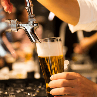 beer being pour from the tap