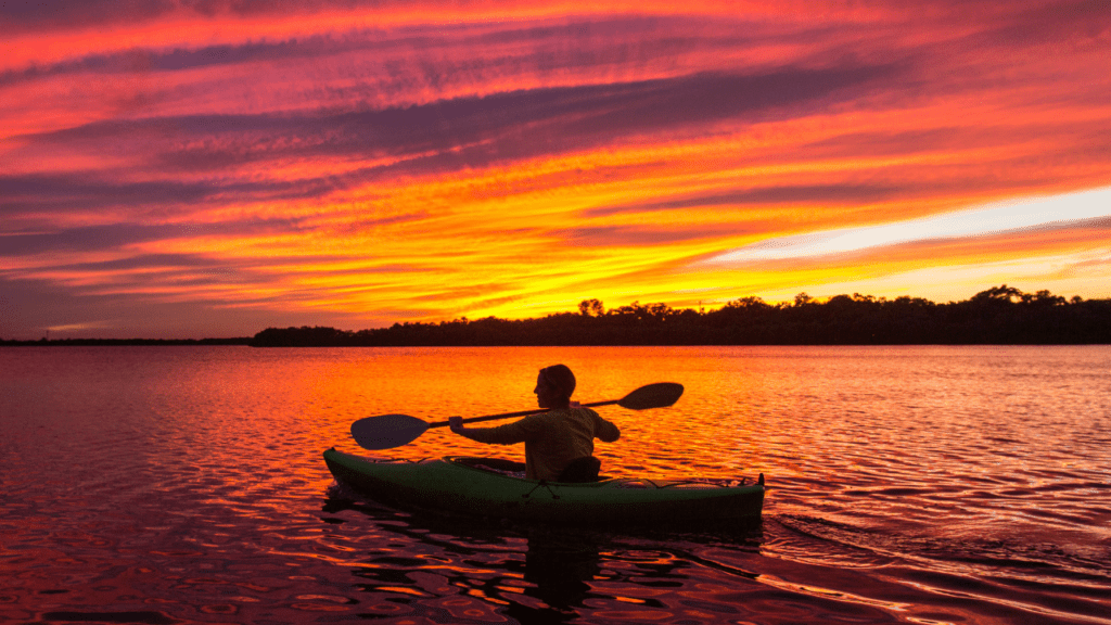 beautiful sunset and kayaking photo