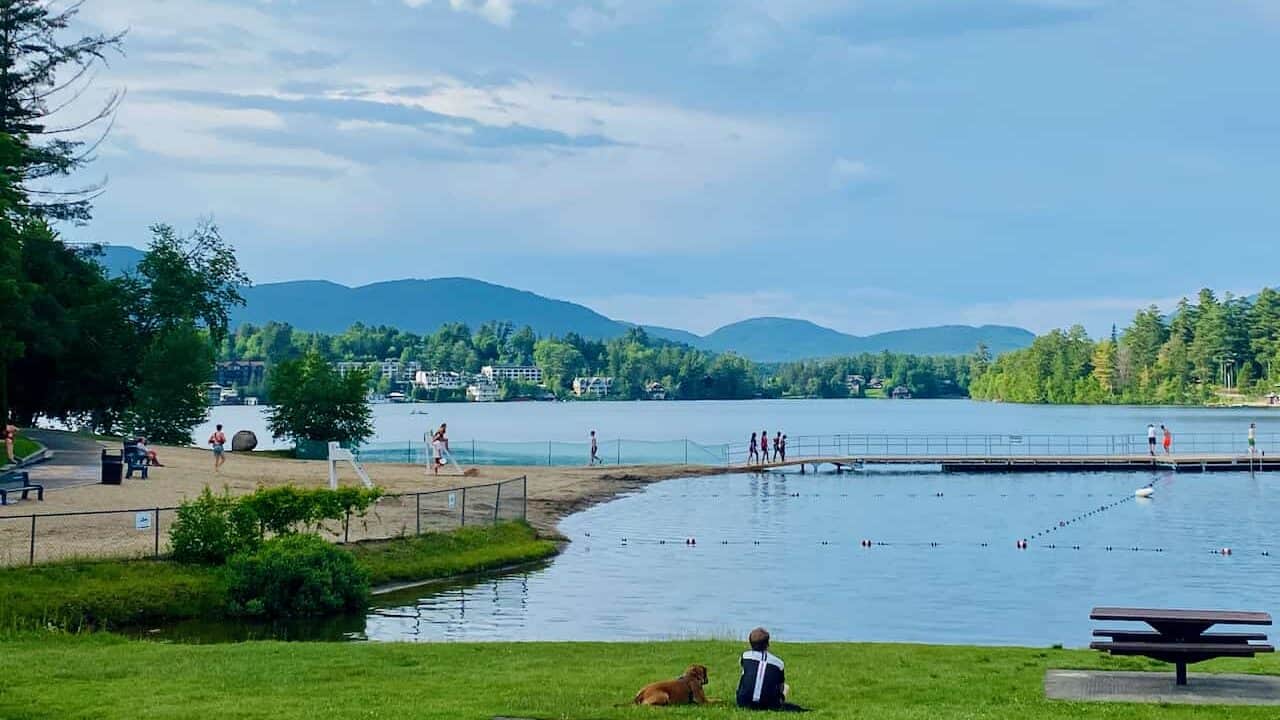 things to do in Lake Placid NY, swimming area showing kids going to teh water