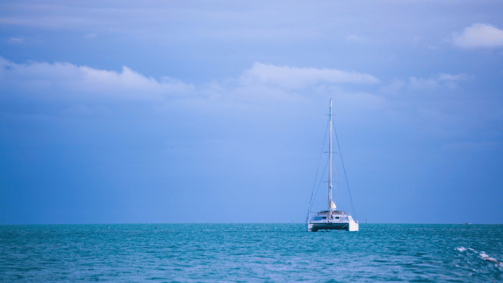 Catamaran in Florida waters in the distance with beautiful water views