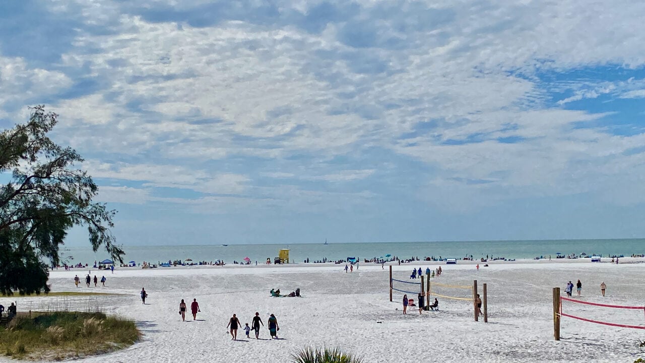Siesta Key Public beach showing volleyball, beach, areas.